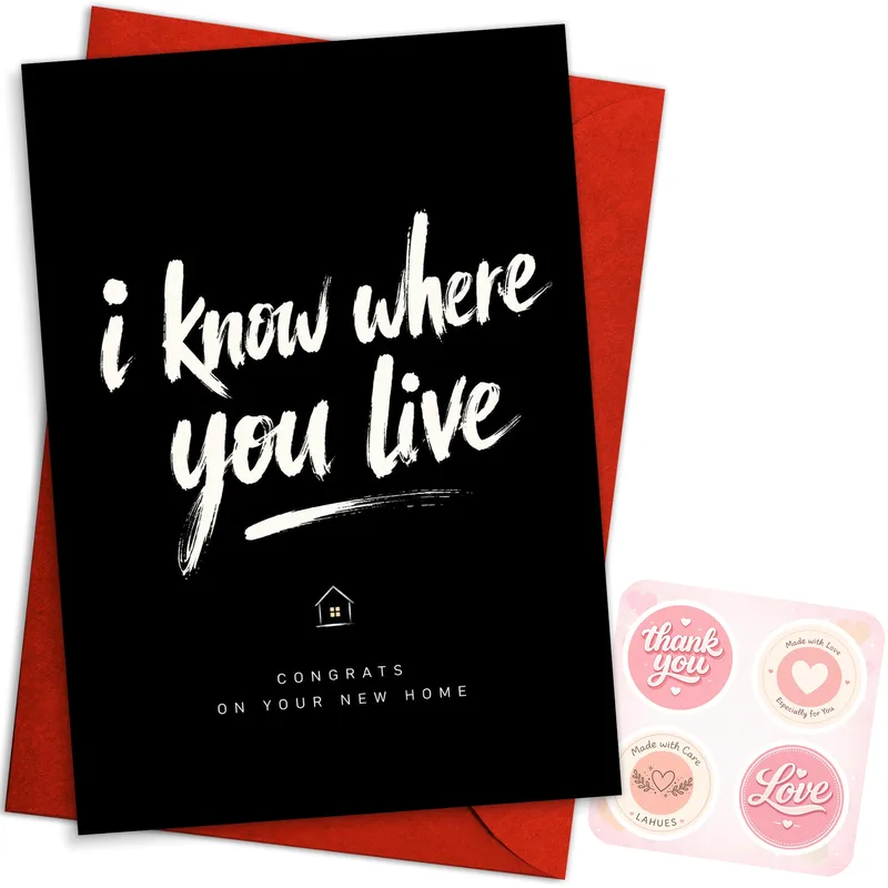 Housewarming Humor Card: a black card with a bold playful threat