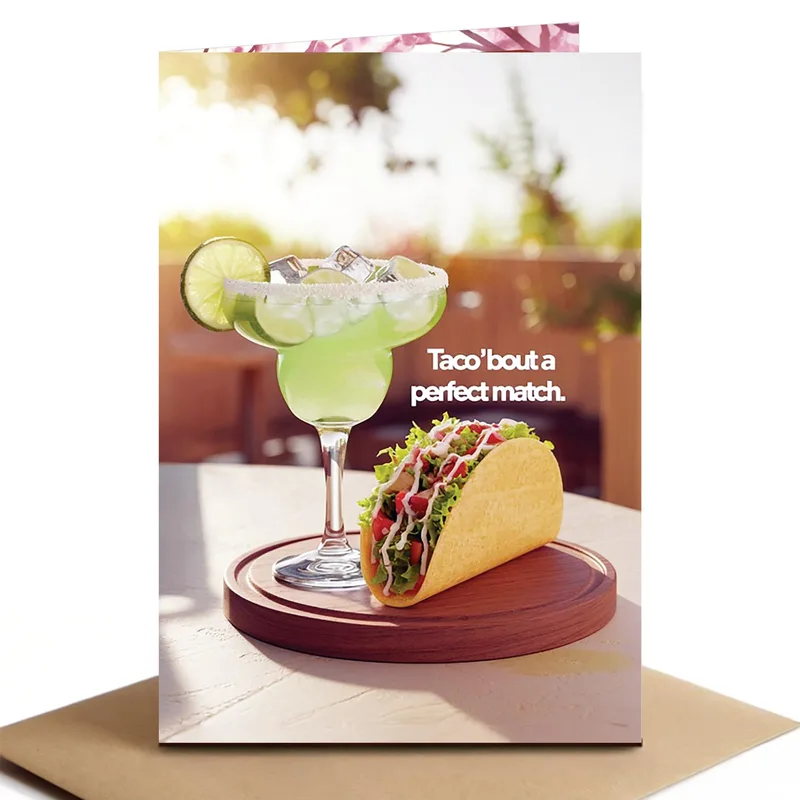 Margarita and Taco Card – Green margarita beside a taco with the words Taco’bout a perfect match – Greeting Card in black