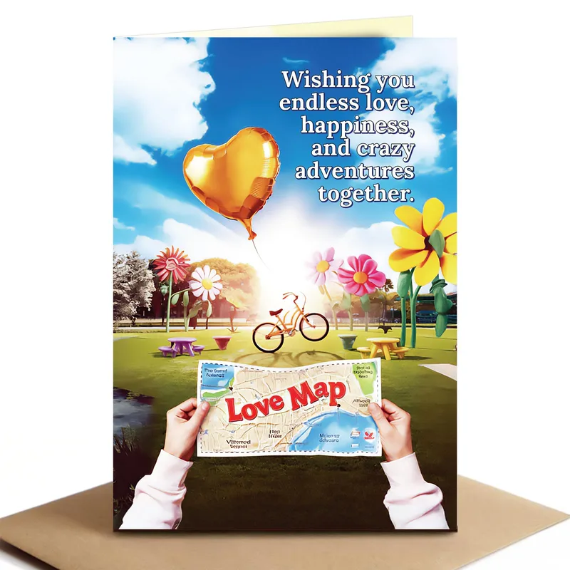 Hands Holding Love Map Card for Romantic Celebrations