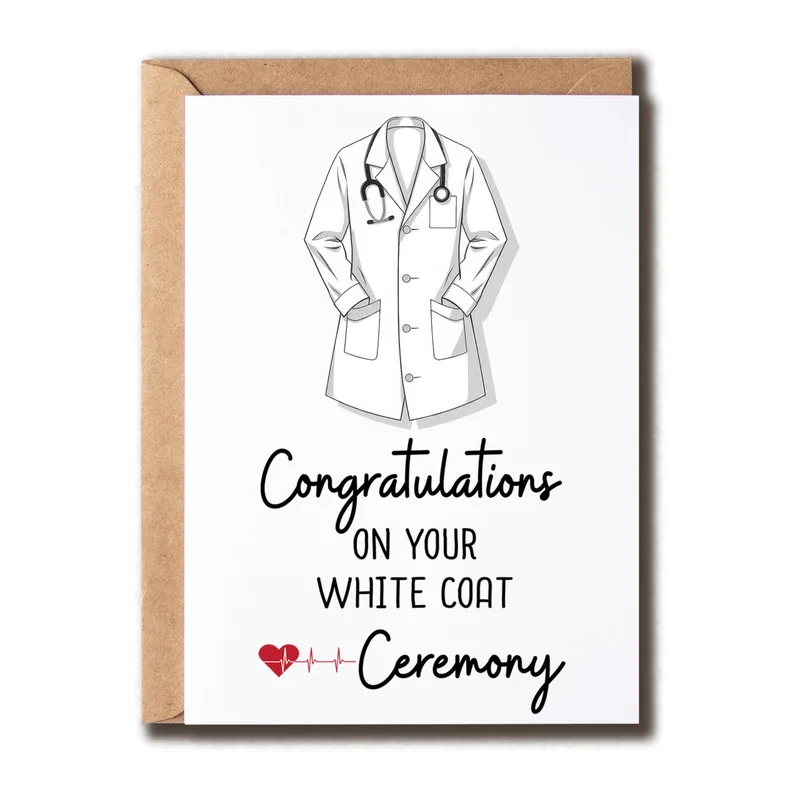 White Coat Ceremony Card – Line-art white coat with stethoscope and congratulations text – Greeting Card in black