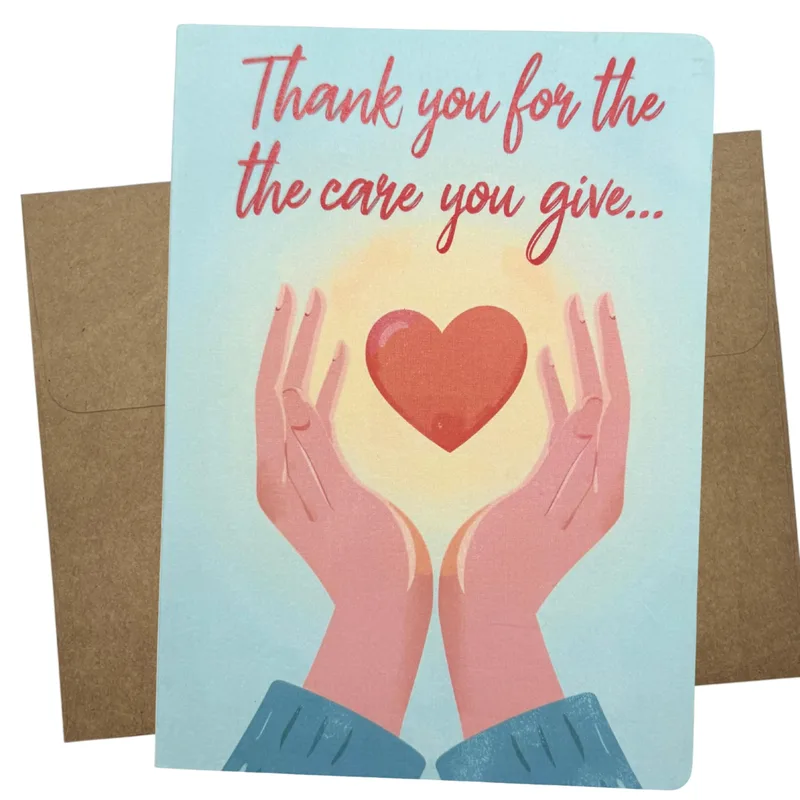 Holding Red Heart Nurse Card: Thank You for the Care You Give