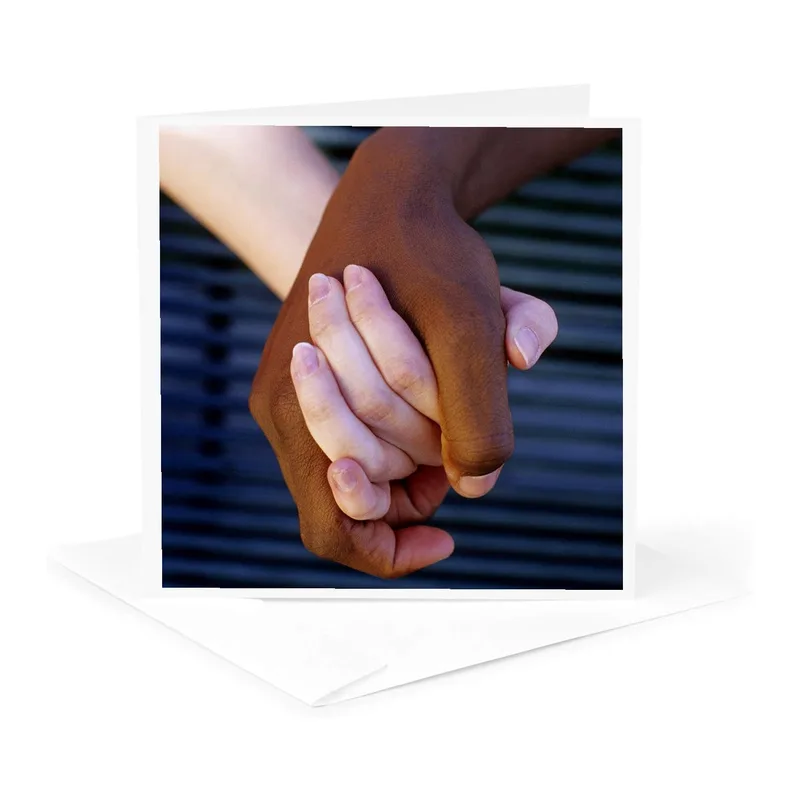 Holding Dark Background Love Card Celebrating Interracial Connection