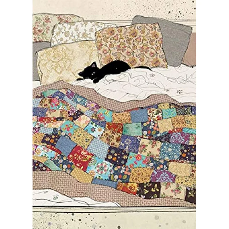 Black Kitty on Quilt Card: A Feline Napping on Patchwork