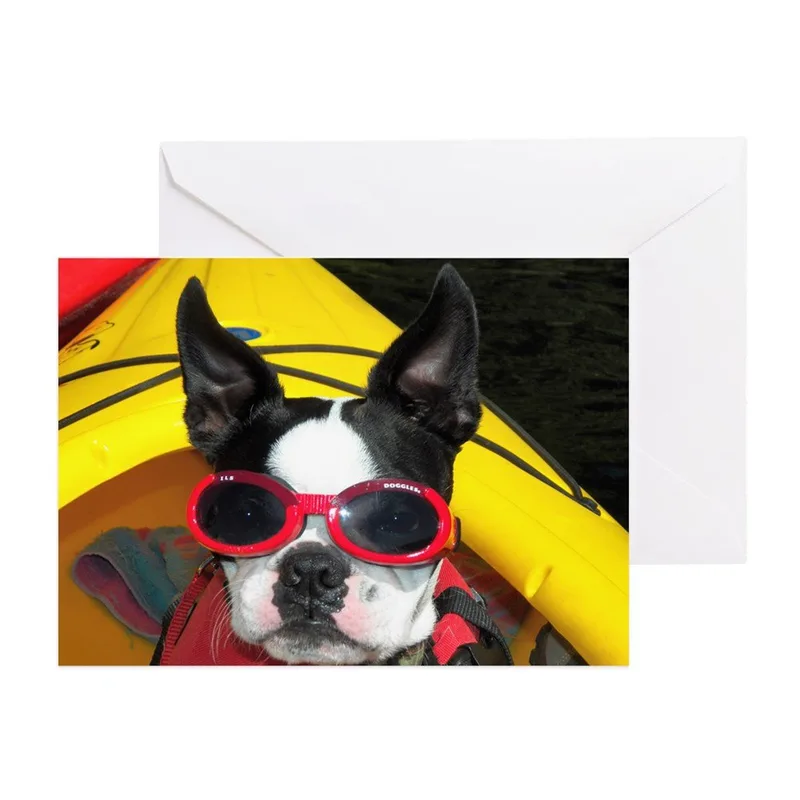 Dog in Red Goggles Card: A Boston Terrier in a Yellow Kayak