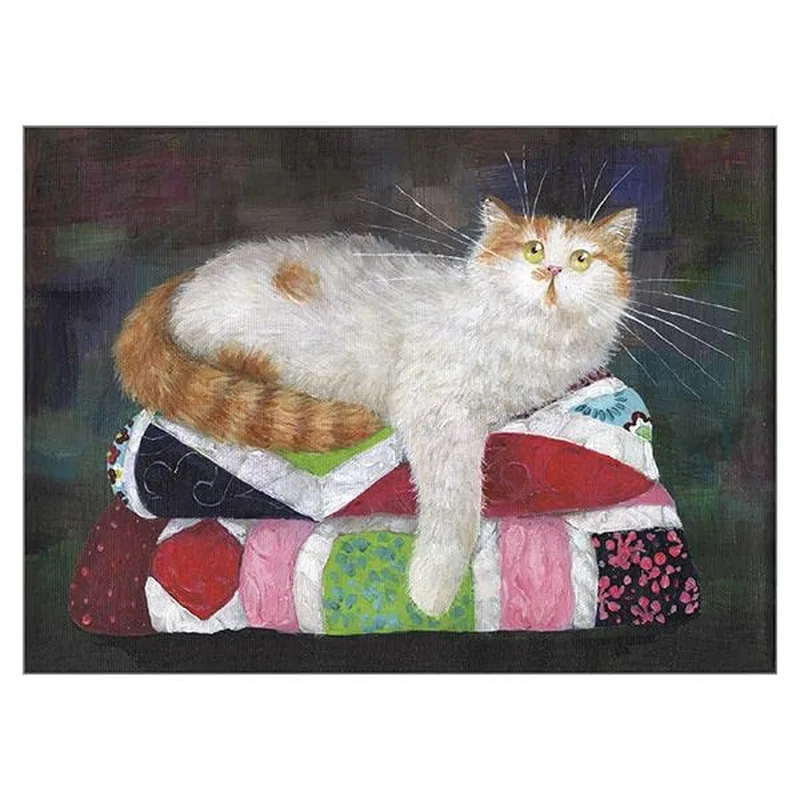 Cat on Quilts Card: A Fluffy Feline Resting on Patchwork